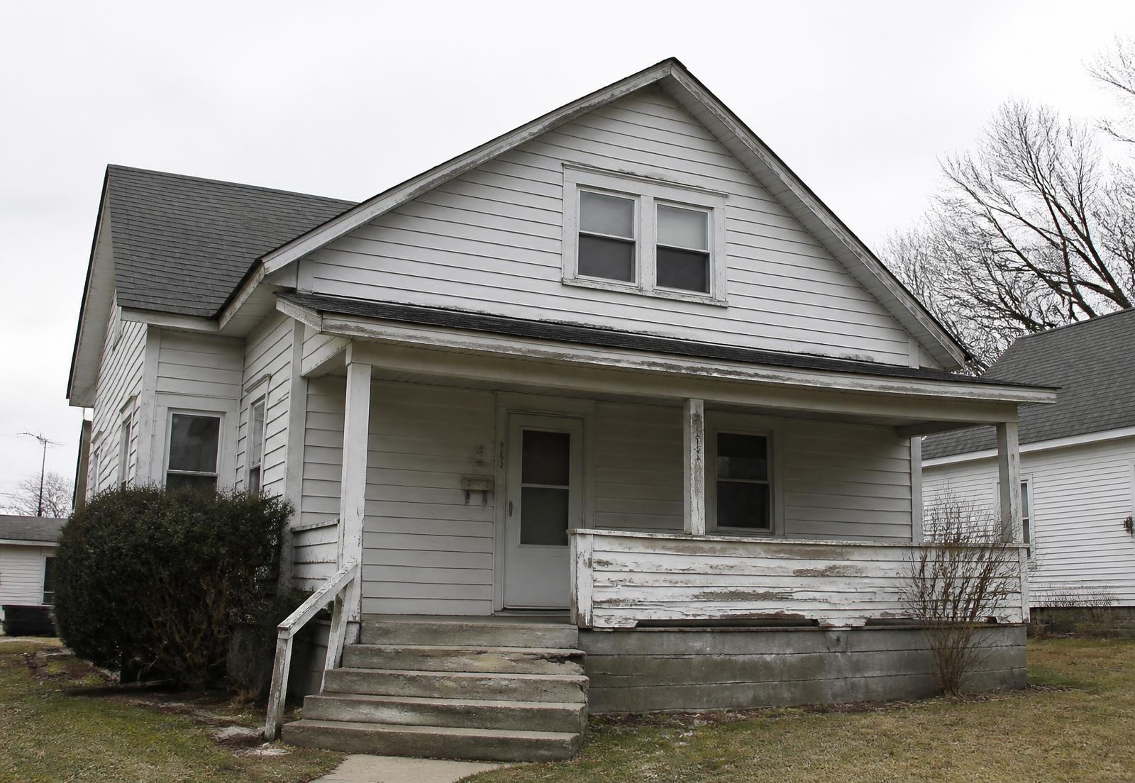 Older house exterior with peeling paint